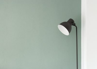 lamp with sage green wall